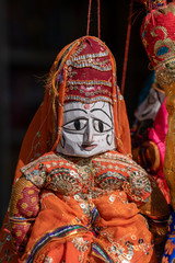 Hand made puppets attached to string in Rajasthan, India. Close up doll