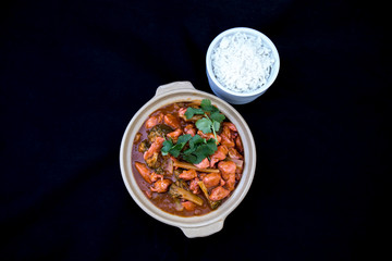 Butter chicken curry with Broccoli in Bowl