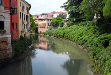 Fototapeta na wymiar Palaces at the riverside of Retrone River in Vicenza City in Ita