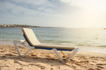 lateral view of a lounger on the beach of Red Sea coast