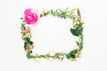 Floral frame with pink flowers, hypericum and eucalyptus on white background. Flat lay, top view