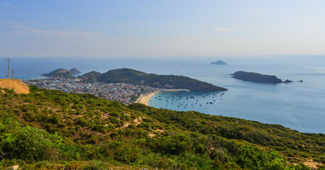 Fototapeta premium Aerial view of township with sand beach