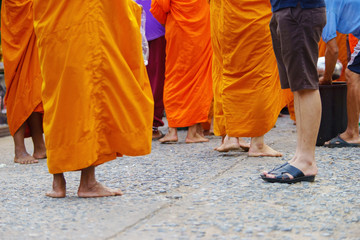 monk's alms-bowl, give food offerings to a Buddhist monk