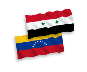 National vector fabric wave flags of Venezuela and Syria isolated on white background. 1 to 2 proportion.