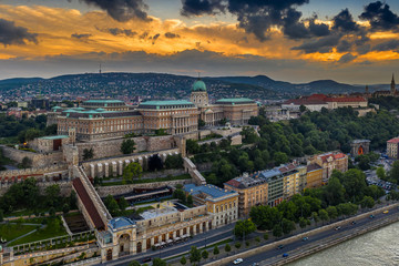 Budapest, Hungary - Aerial view of Buda Castle Royal Palace with dramatic golden sunset