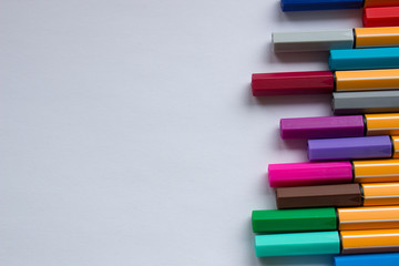 Set of colorful pens on white background