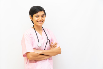 Asian female doctor with shot black hair wearing pink uniform and has stethoscope on shoulder. Confident and warmth looks isolated in white background. Space for text