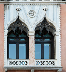 Ancient venetian window and marble balcony, beautiful architectural element