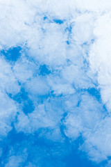 white cirrocumulus clouds on blue sky