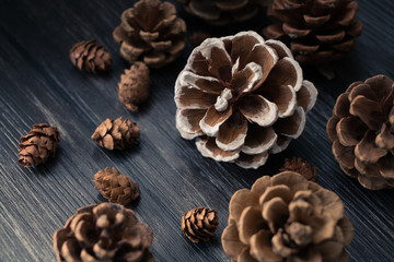 Brown deal apples on wood table.