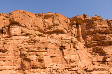 Fototapeta premium Coloured Canyon is a rock formation on South Sinai (Egypt) peninsula. Desert rocks of multicolored sandstone background. 