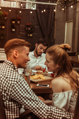 Beautiful alluring nice-looking young-adult attractive cheerful man and woman flirting