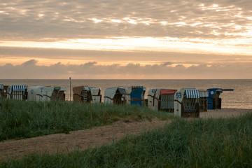 Fototapeta na wymiar scenic seaside scenery with beach chairs