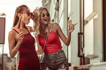 Fototapeta premium Beautiful nice-appealing stunning charming arresting glamorous ladies doing window shopping