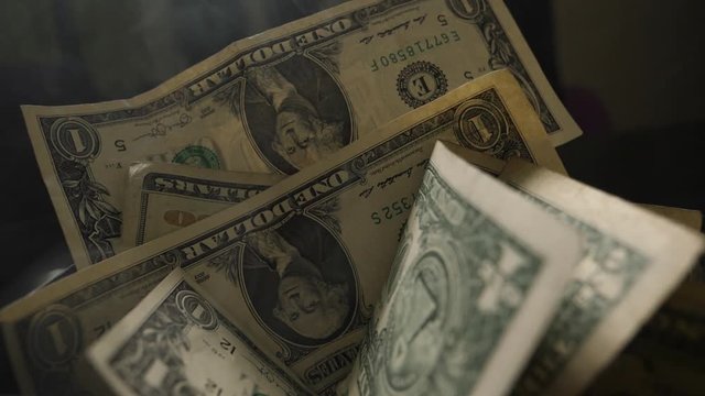 Smoke Over Dollar bills in a box, money background. Dollars money set Slow With Shallow Dof and smoke. Dollars, money close up.