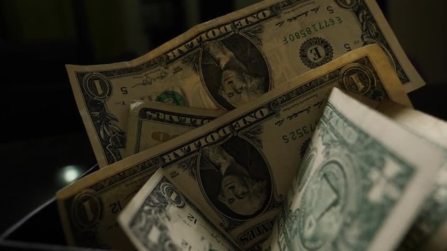 Smoke Over Dollar bills in a box, money background. Dollars money set Slow With Shallow Dof and smoke. Dollars, money close up.