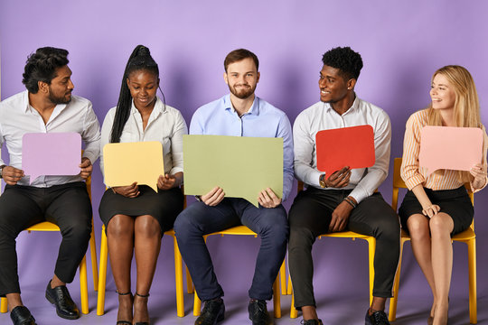 Diverse Group Of Young Multicultural People Sitting And Looking At Each Other With Blank Thought Bubbles Waiting For Job Interview