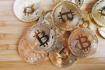 Gold bitcoin on the table.
