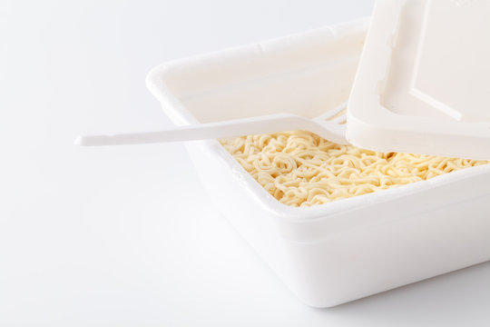 Instant noodles in a plate. Fast food, junk food, unhealthy food. Rolton. Doshirak
