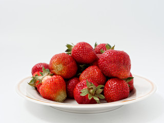 red ripe strawberry appetizing berry on a white background