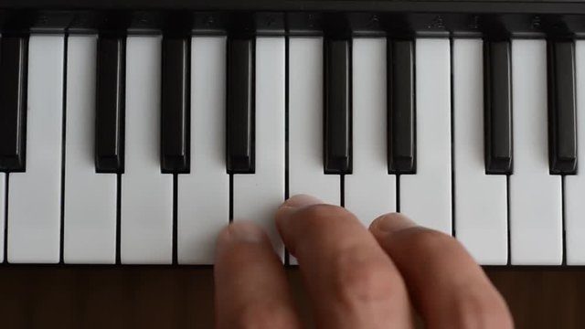  The pianist plays the piano