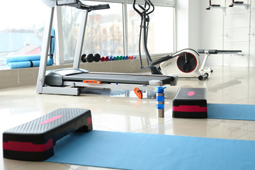 Interior of gym with modern equipment