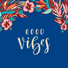 Handwritten phrase Good Vibes and hand-drawn tropical plants on dark blue background © Skrolan_Kabi
