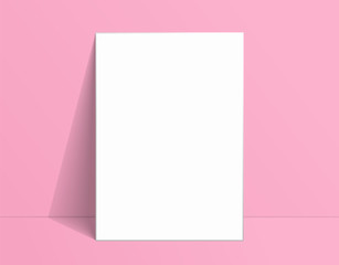 Obraz na płótnie Canvas White poster mockup standing on the floor near pink wall. Blank Canvas Mockup for design