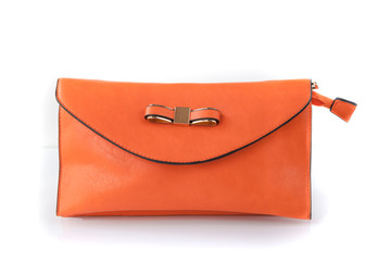 Orange handbag isolated on white background. Orange clutch