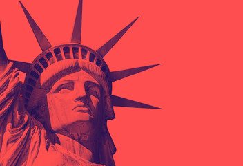 detail of the face of the statue of liberty with a red duo tone effect