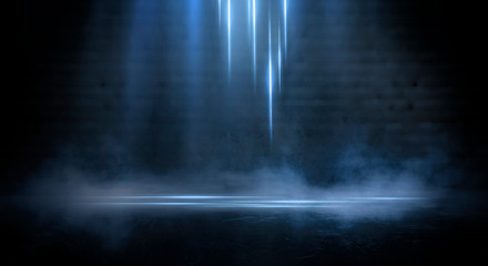 Dark empty scene, blue neon searchlight light, wet asphalt, smoke, night view, rays. Empty black studio room. Dark background. Abstract dark empty studio room texture.  Product showcase spotlight back