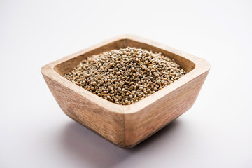 Pearl Millet or Bajra seeds also known as sorghum, in a bowl, selective focus