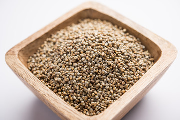 Pearl Millet or Bajra seeds also known as sorghum, in a bowl, selective focus