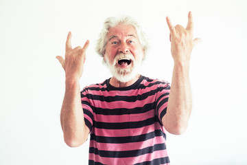 Senior people caucasian man do rock'n roll signs with crazy funny expression portrait - happy...