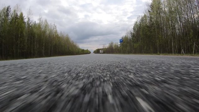 Highway.The car goes at high speed.Road.Enjoy the high-speed ride.