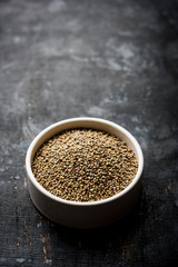 Pearl Millet or Bajra seeds also known as sorghum, in a bowl, selective focus