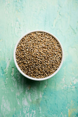 Pearl Millet or Bajra seeds also known as sorghum, in a bowl, selective focus