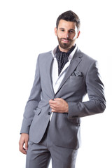 A young man wearing suit on a white background