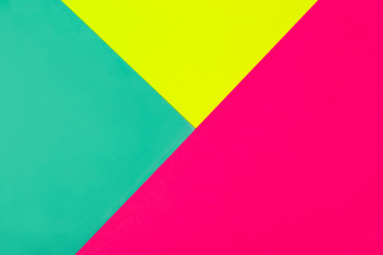Abstract geometric background in bright neon colors. Glowing Magenta diagonal