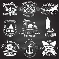 Fototapeta premium Set of sailing camp, yacht club and surf club badges. Vector. Concept for shirt, print, stamp. Vintage typography design with surfboard and sailing boat silhouette. Extreme water sport.