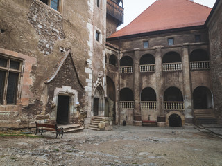 Fototapeta na wymiar interior and exterior of the Hunedoara castle in Romania in foggy conditions