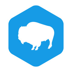 Icono plano silueta bisonte en hexágono color azul