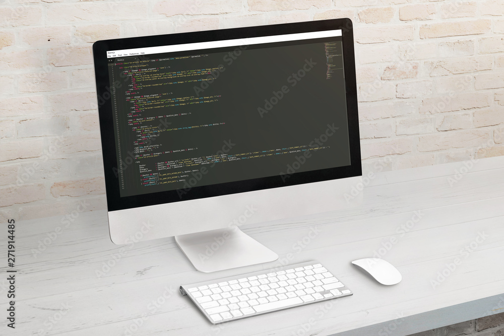Poster Developer computer with code on display. Clean office desk.