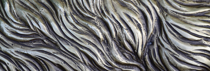 Details and decorative bas-relief ornament from metal of forged stamping iron gate as background...