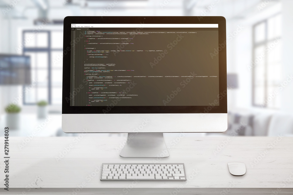 Poster Computer display with code editor. The concept of a developer workplace. The office is in the background.