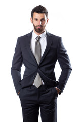 A young man wearing suit on a white background