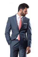 A young man wearing suit on a white background