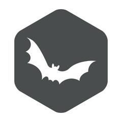 Icono plano silueta murciélago en hexágono color gris