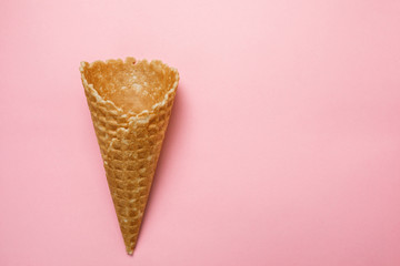 Various ice cream cones on a pink background. Minimal summer concept.