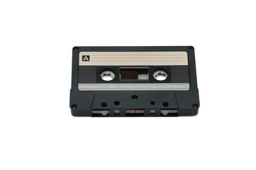 Compact audio tapes for magnetic recording on a white background.Compact cassettte
